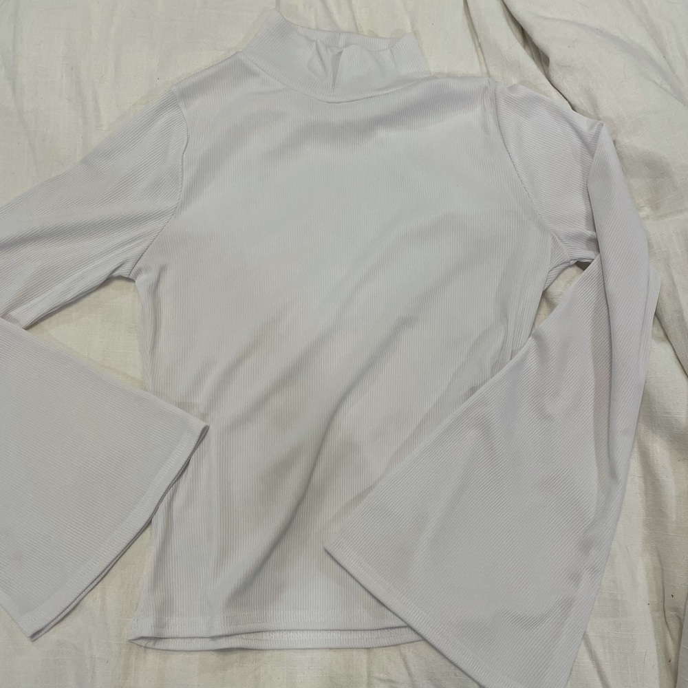 White mock neck crop top with bell sleeves